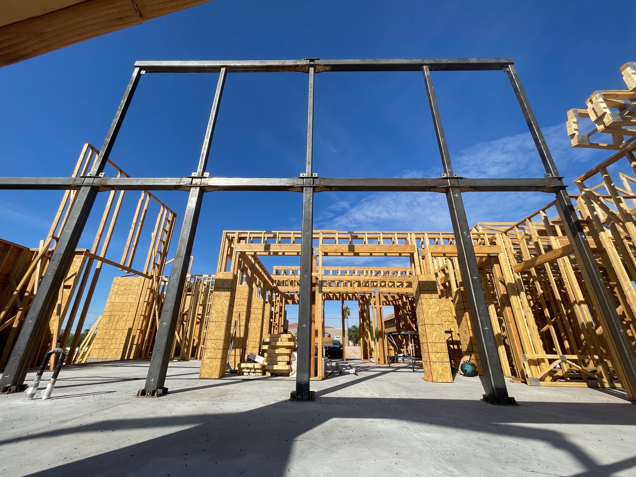 Engineered steel moment frame fabricated and installed in a wood-framed home in North Phoenix